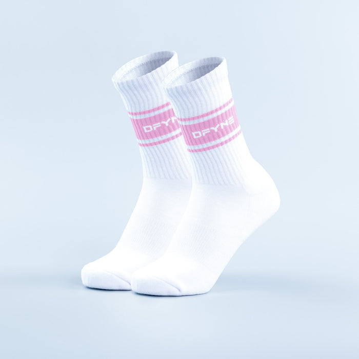 White crew sports socks with pink stripe bands and ribbed cuff