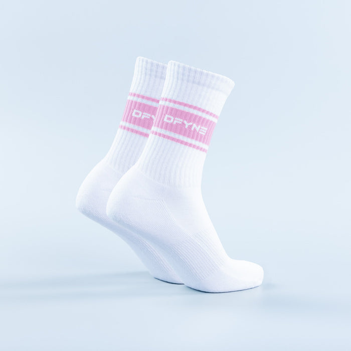 White crew sports socks with pink stripe and logo