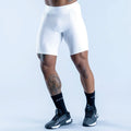 White compression base-layer shorts with flat seams and wide waistband