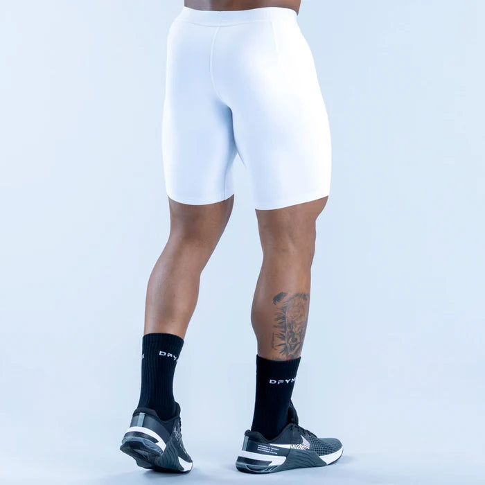 White compression base-layer shorts, knee-length with contoured legs and seam details