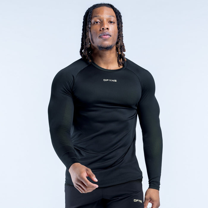 Black long-sleeve training T-shirt with crew neck and small chest logo.