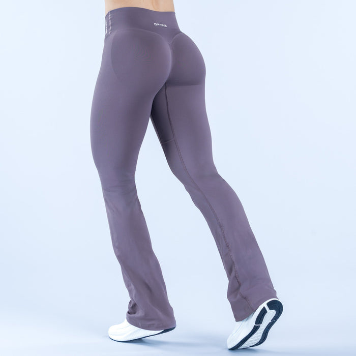 Lavender flared leggings with sculpted back panel and long seam stitching