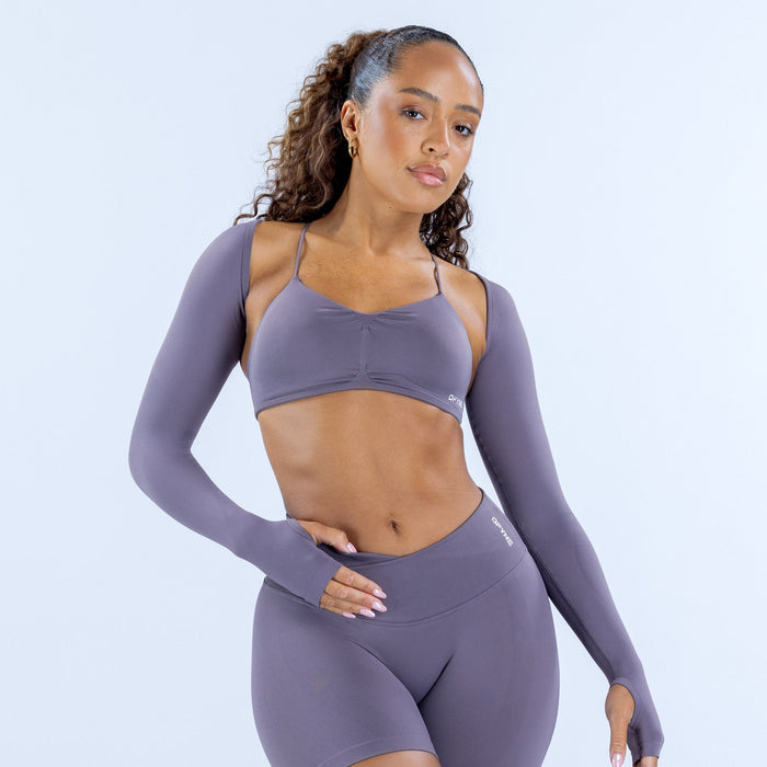 Women’s long-sleeve athletic shrug in mauve purple, cropped fit over sports bra